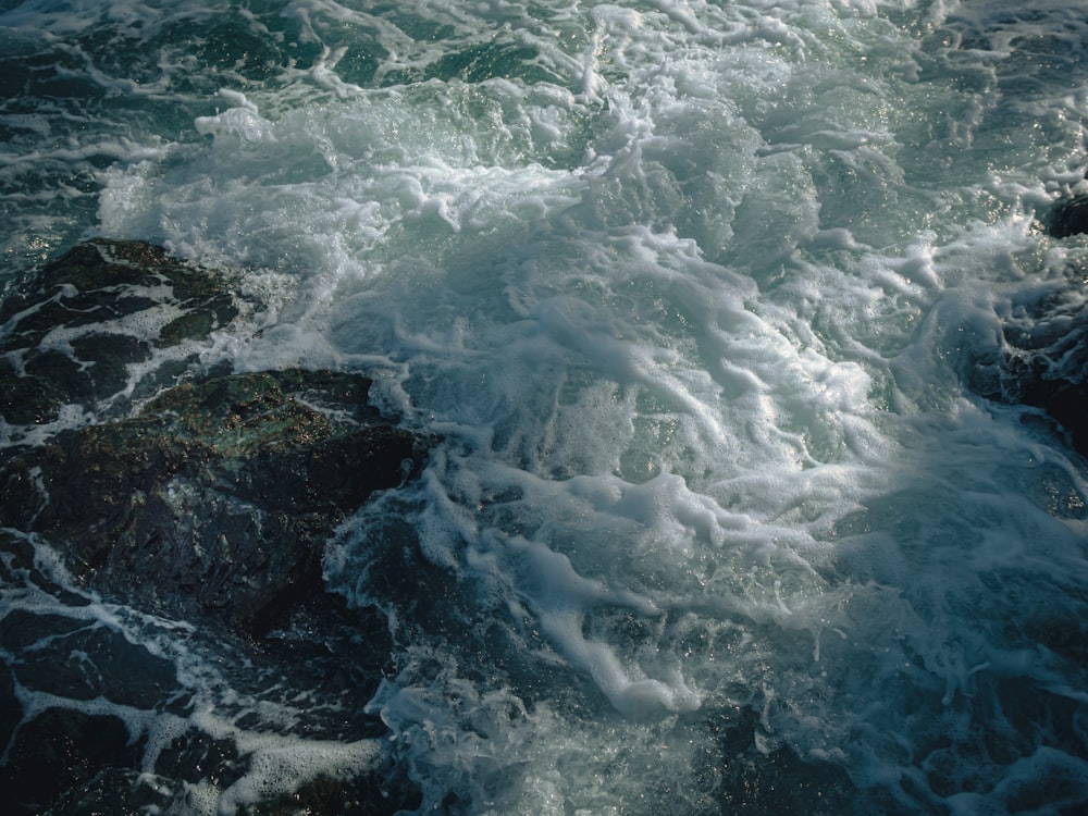 a large body of water surrounded by rocks