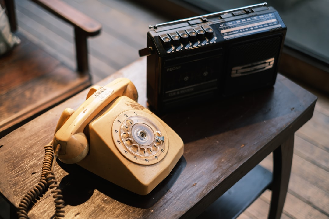 brown and beige rotary phone