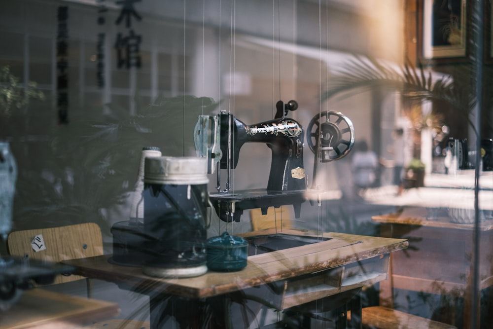 black sewing machine on table