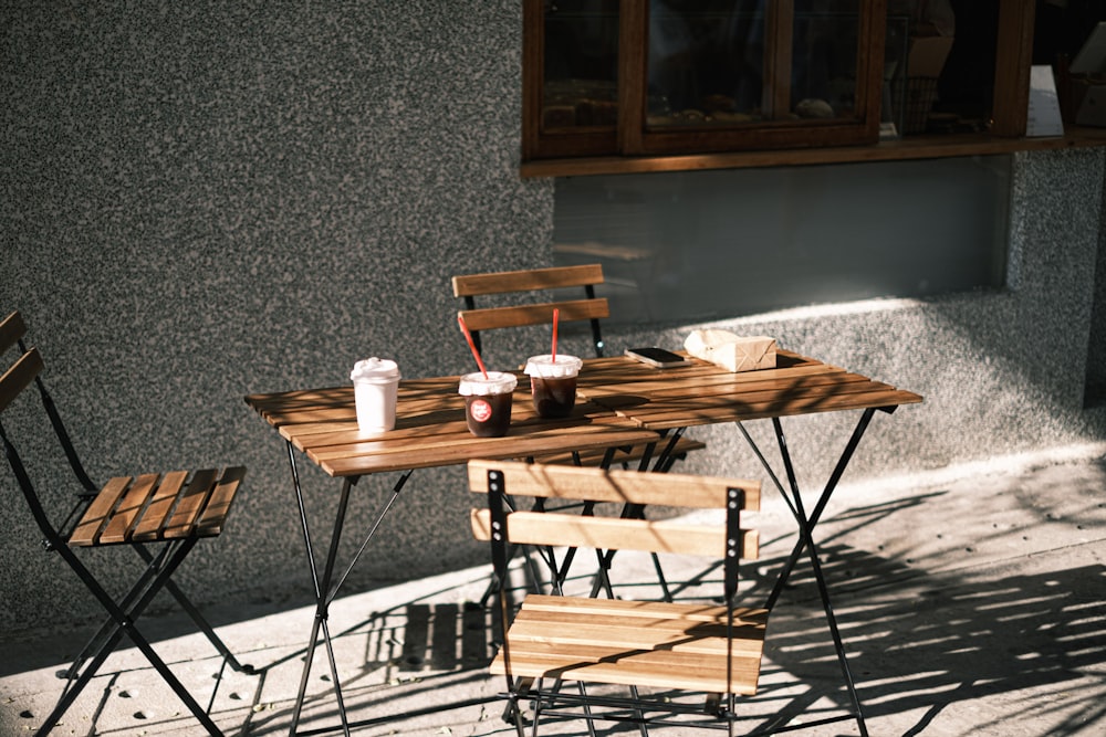 brown wooden table with chairs