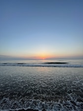 Sunrise over the ocean viewed from the lanai of Menehune Shores Unit 519.