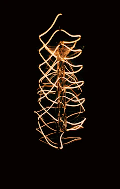 a long exposure photo of a string of lights