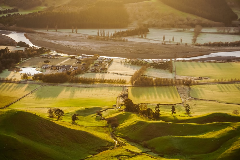 an aerial view of a rural area with a river running through it