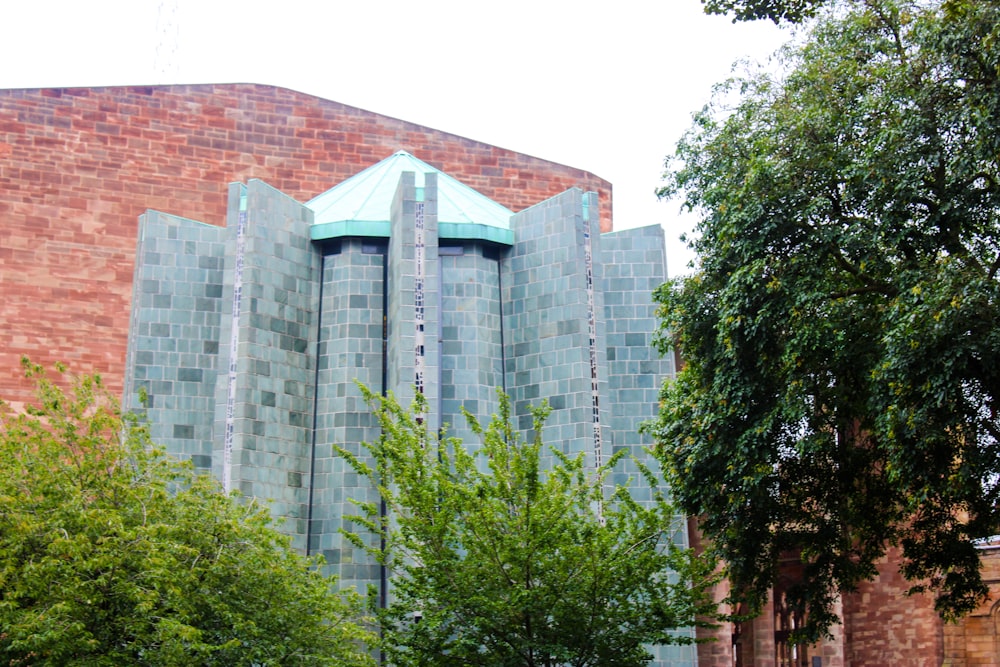 a tall building with a clock on the side of it