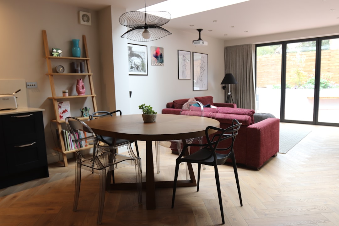 brown wooden table with chairs