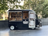 a food truck parked on the side of the road