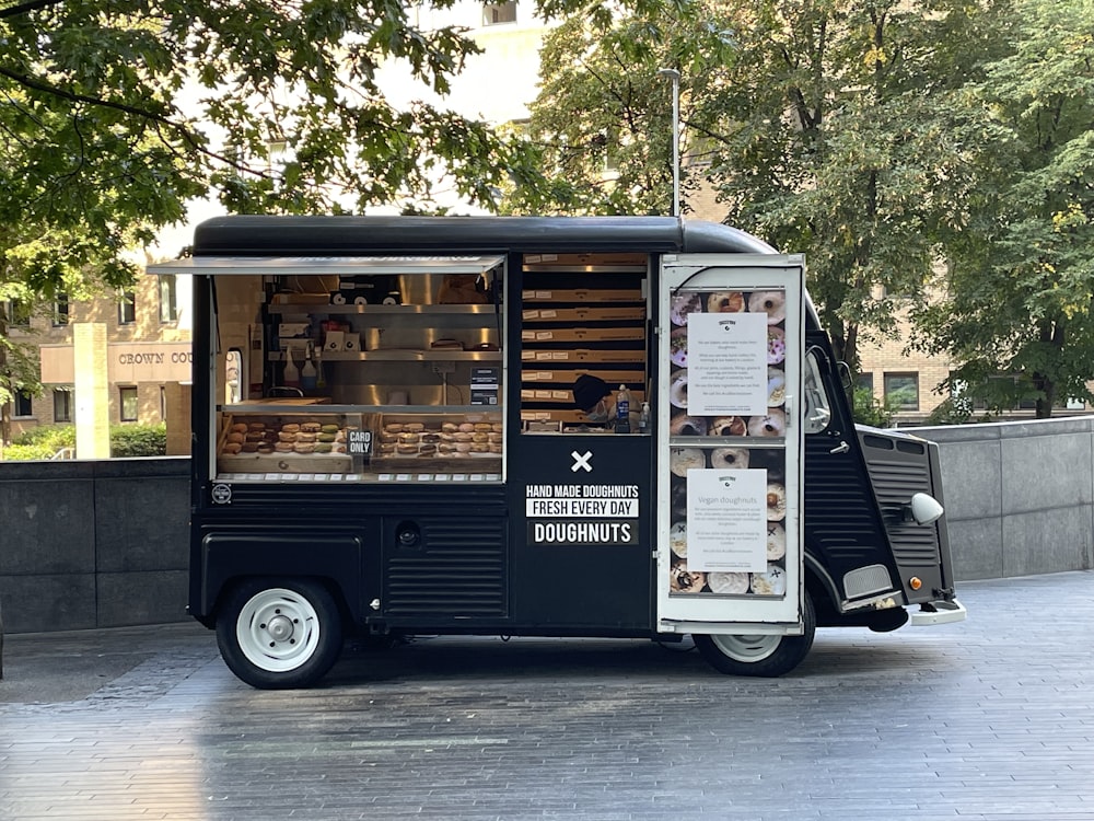 a food truck parked on the side of the road