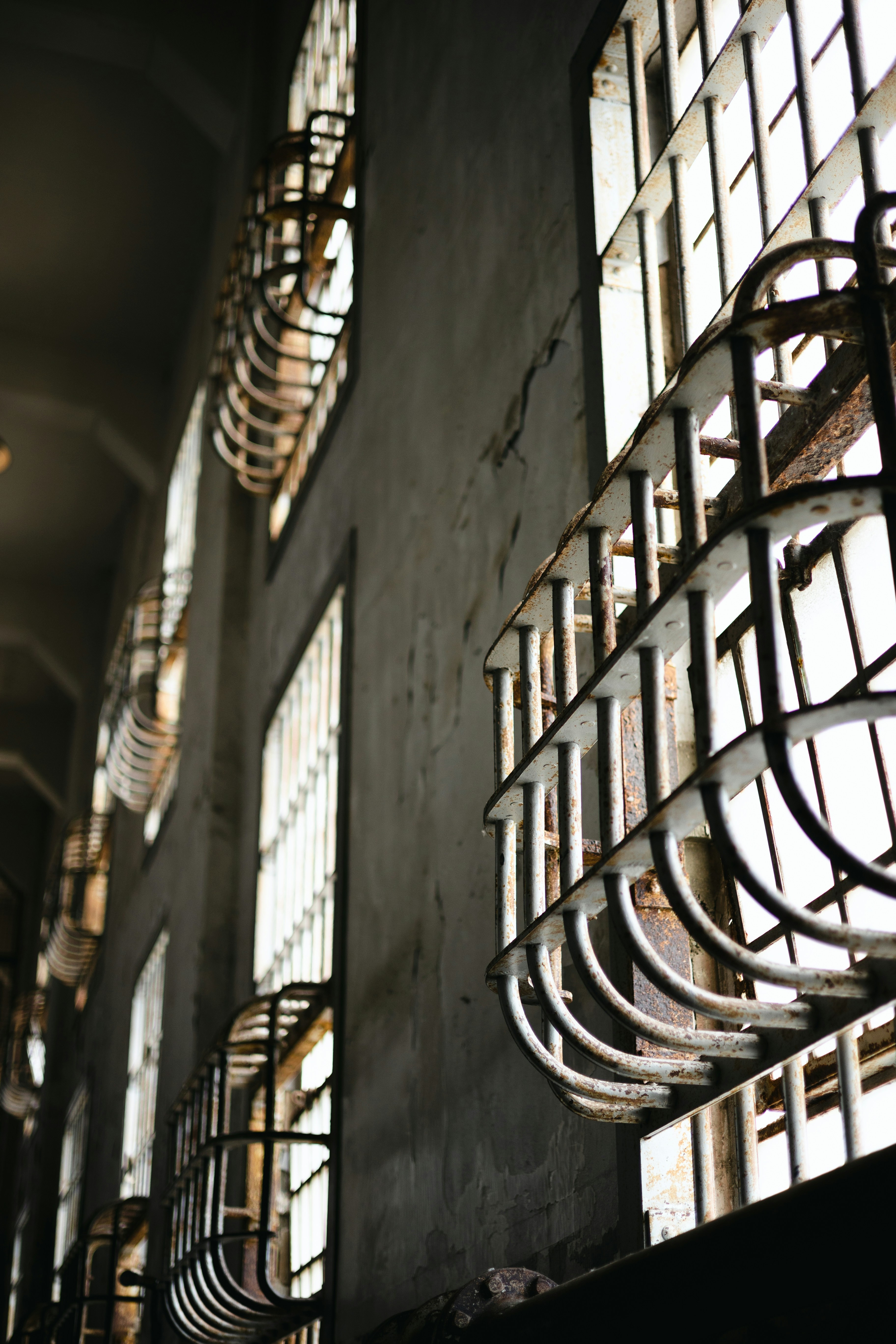 a row of chairs sitting in front of a window