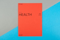 A vibrant red card with the word 'HEALTH' prominently displayed in black text, accompanied by smaller text indicating the number 09 (77) and phrases such as '77 HUMAN NEEDS' and '(physical)' at the top. The background consists of intersecting areas of blue and gray-green color.