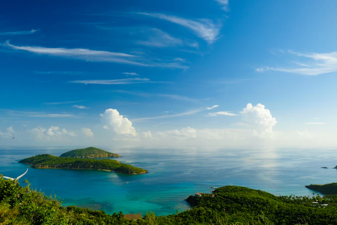 Turquoise island bay and green coastline, the kind of destination a trusted travel advisor Canada re