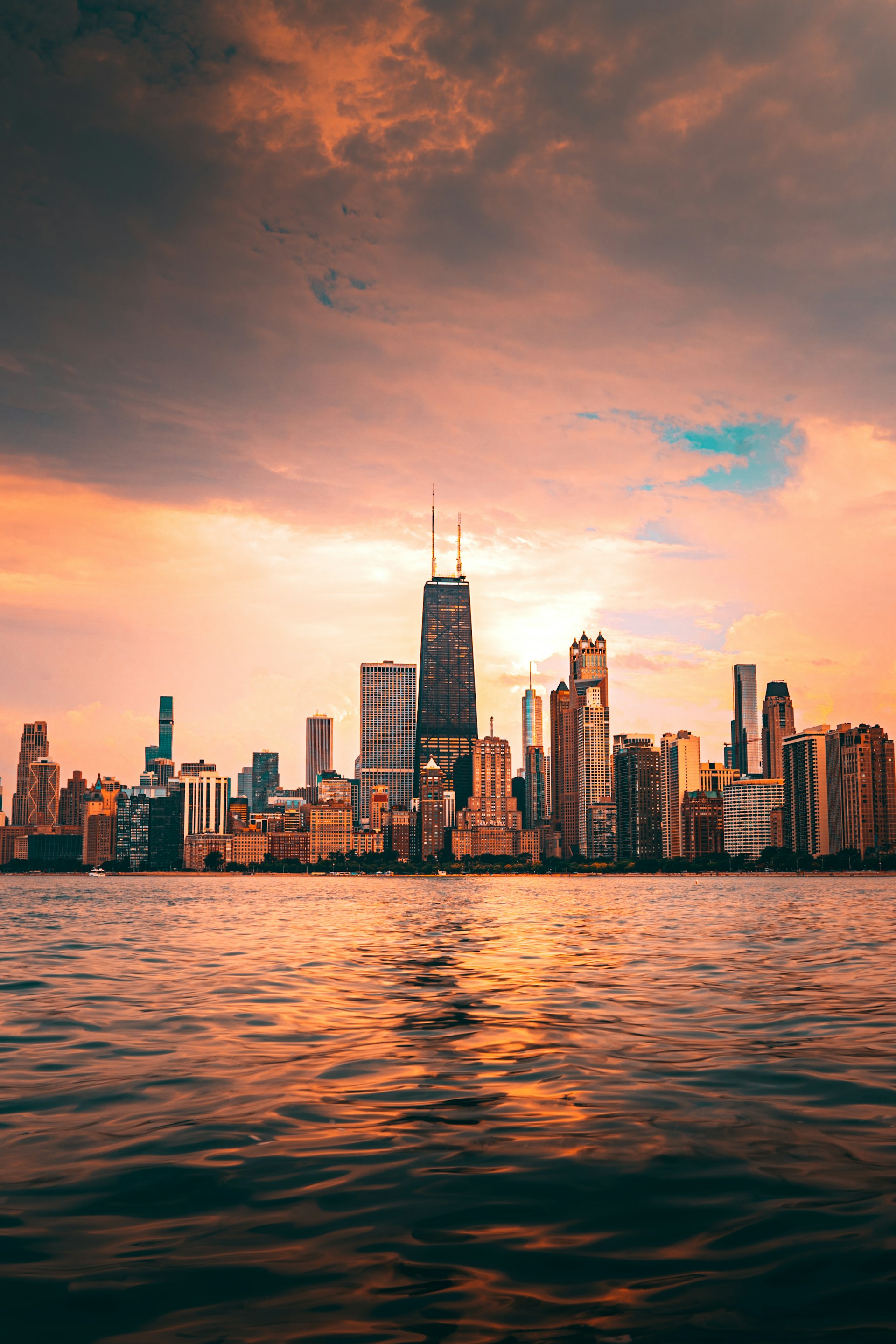 Chicago skyline at sunset over Lake Michigan