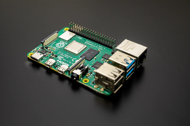 A Raspberry Pi single-board computer on a dark table