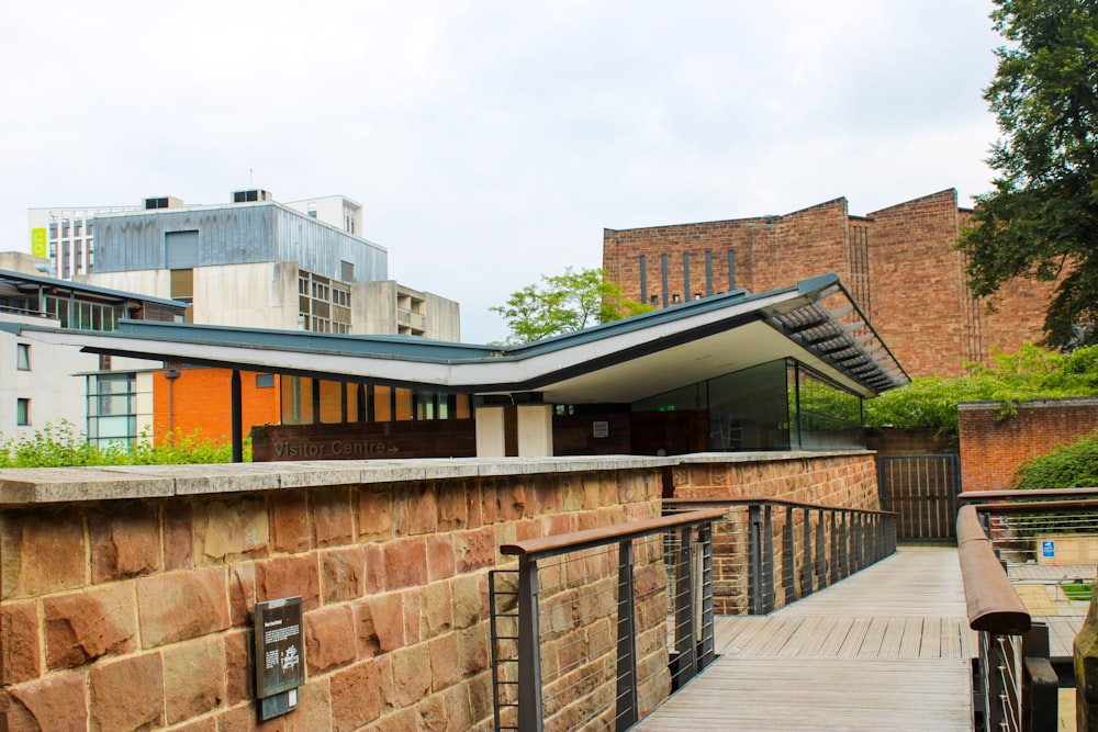 a walkway leading to a building in a city