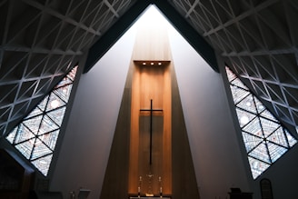 the inside of a church with stained glass windows