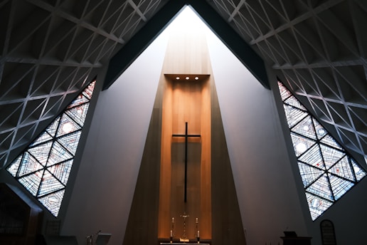 the inside of a church with stained glass windows