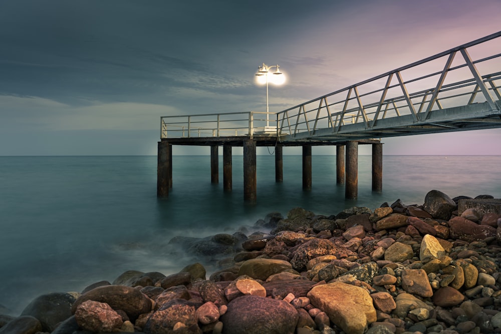 a pier that is next to a body of water