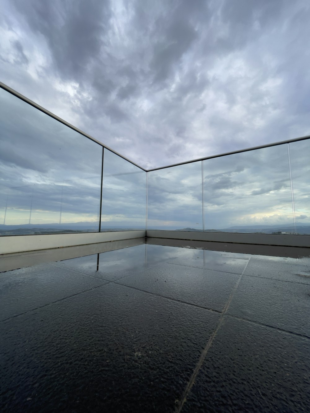 an empty room with a view of the sky