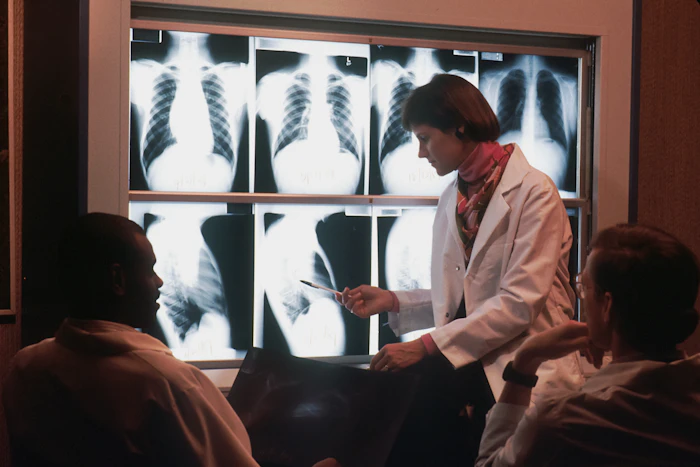 Doctor discussing an X-ray with a colleague