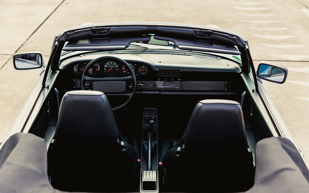the dashboard of a car is shown from above