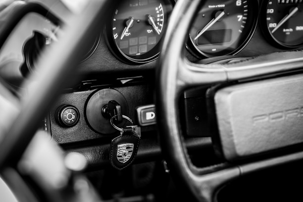 Close-up of a car dashboard showing a toll tag device.