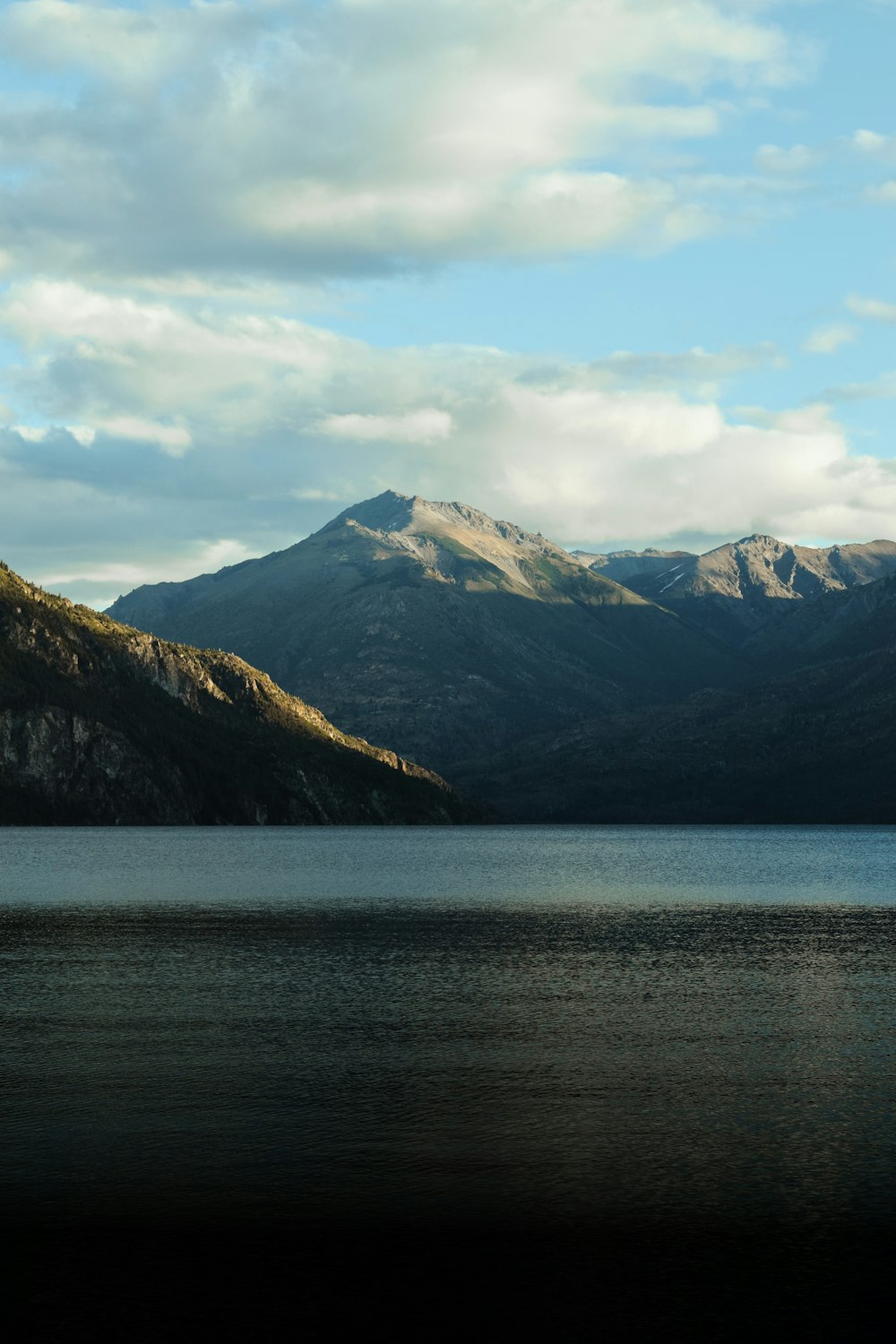 a large body of water surrounded by mountains