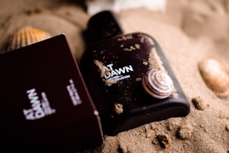 a close up of a cell phone on a beach