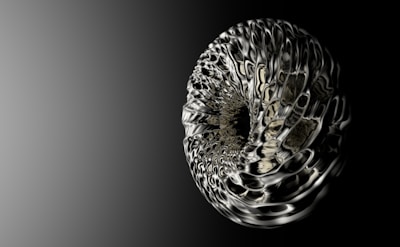 a black and white photo of an animal's head