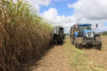 a couple of tractors that are in the dirt