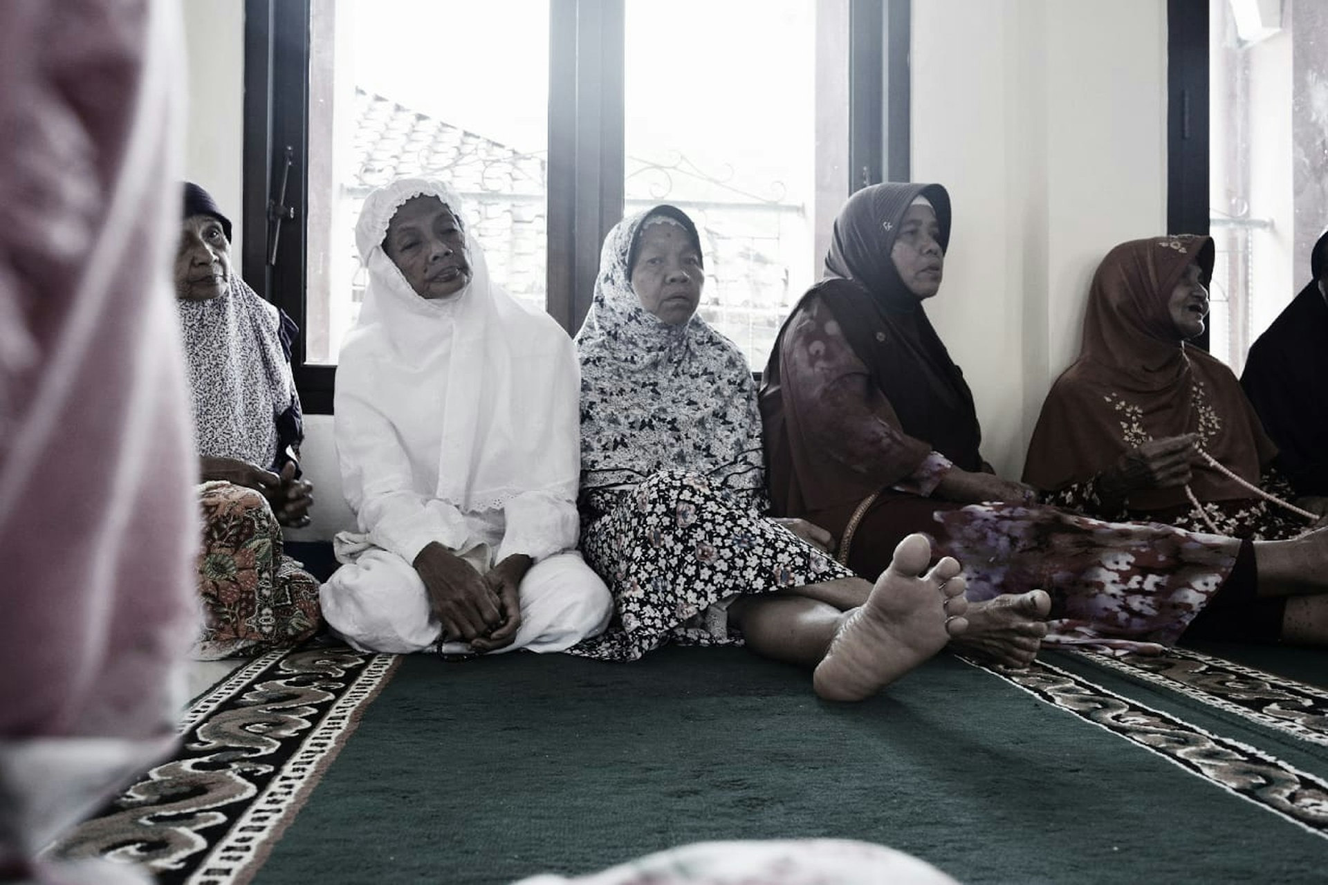 woman wearing yellow long-sleeved dress under white clouds and blue sky during daytime