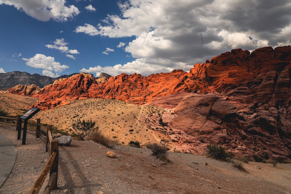 a person standing on a path in the desert