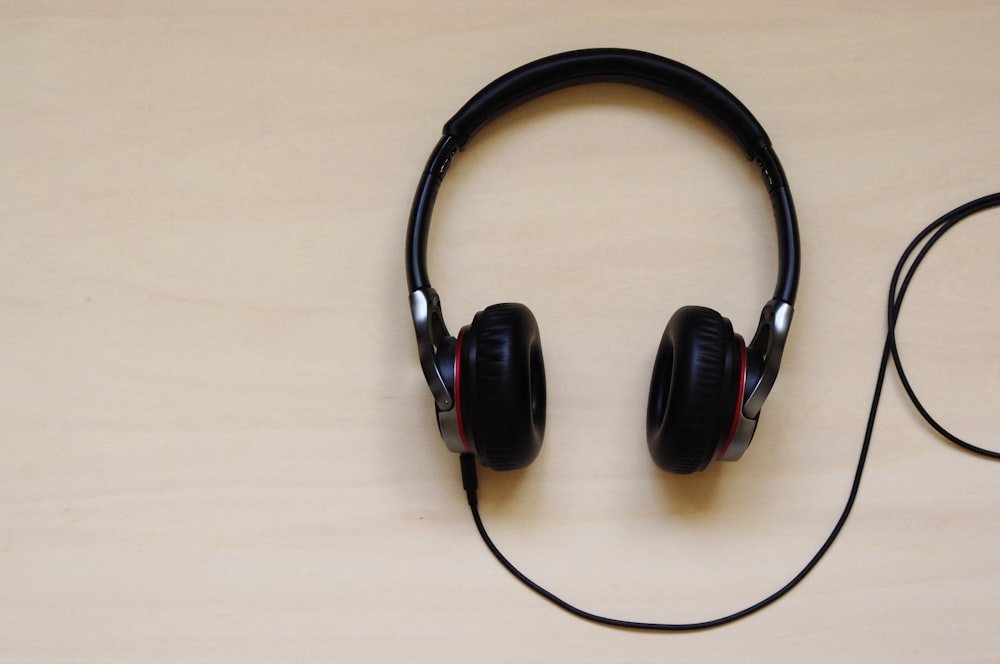 a pair of headphones sitting on top of a table