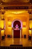 Evening lights illuminating the stage where bhakti songs fill the air with devotion.