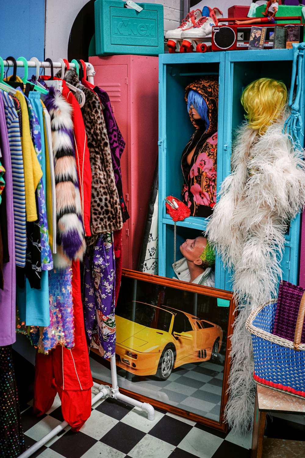 a room filled with lots of colorful clothes