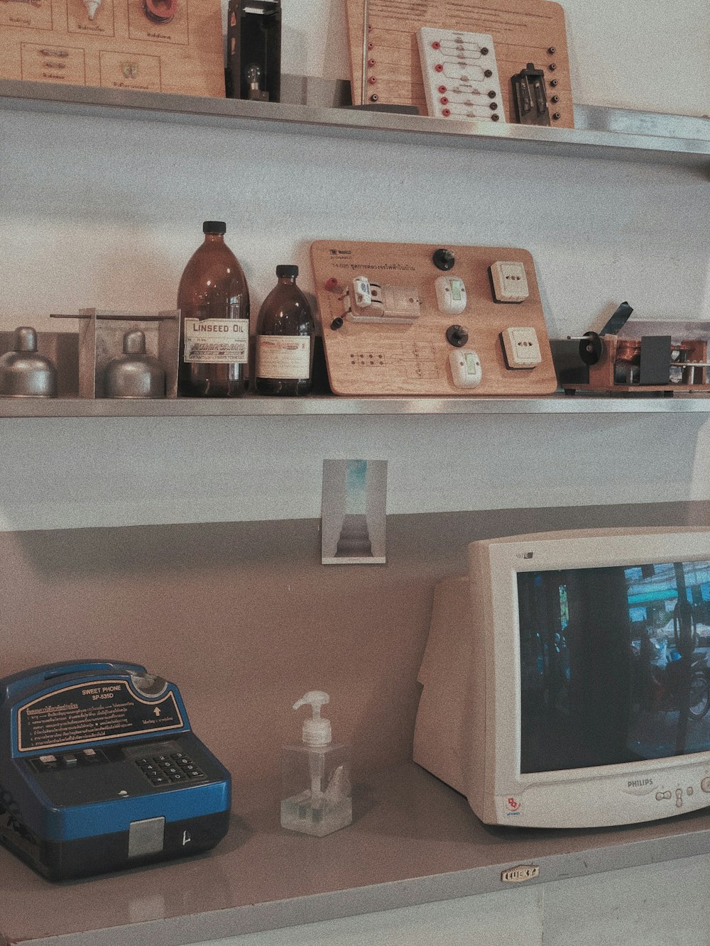 a computer monitor sitting on top of a desk