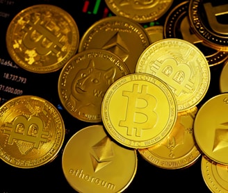 a pile of gold bitcoins sitting on top of each other