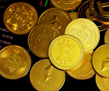 a pile of gold bitcoins sitting on top of each other