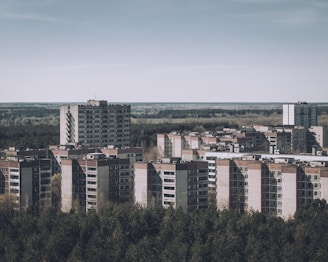 Espoo City, Finland with tall buildings and trees in the foreground