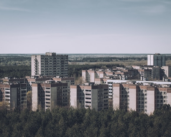 Espoo City, Finland with tall buildings and trees in the foreground