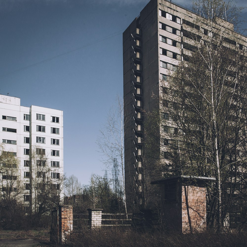 a very tall building next to a very tall building