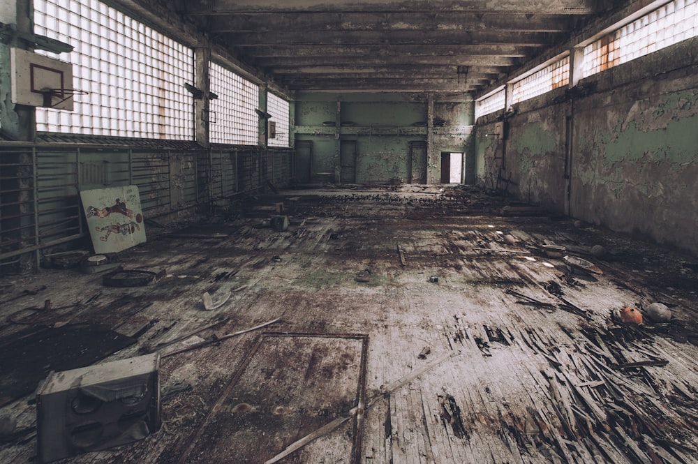 an old run down building with lots of windows