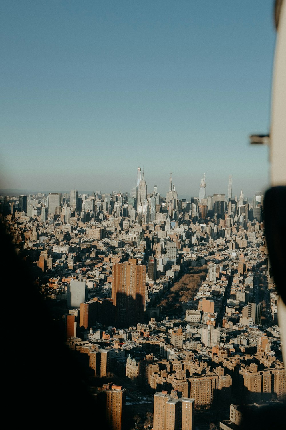 a view of a city from a plane window