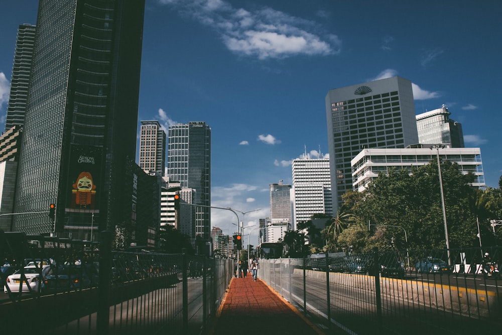 a city street lined with tall buildings