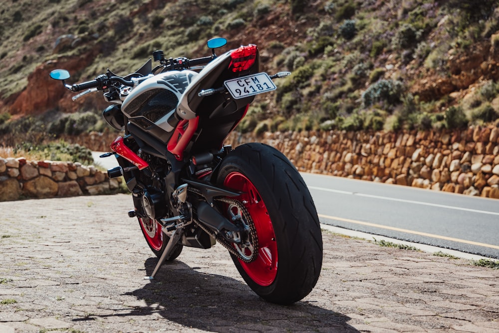 a motorcycle parked on the side of a road