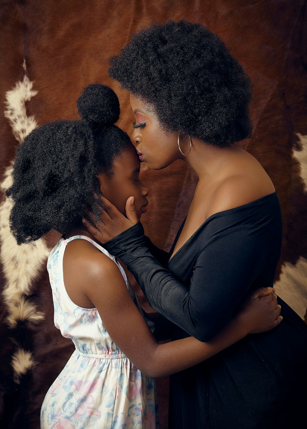 a couple of women standing next to each other