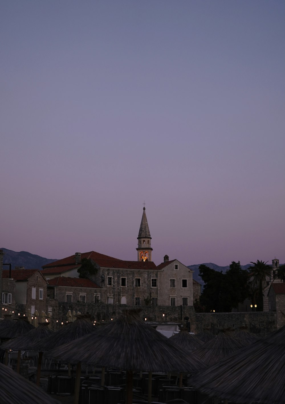 a building with a clock tower at dusk