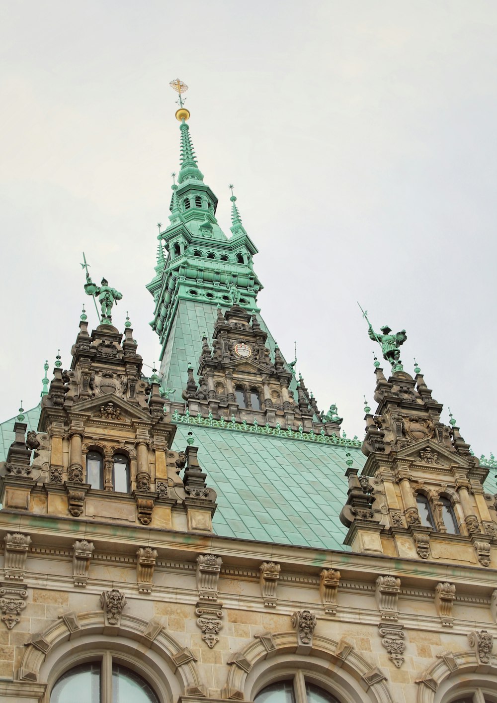 a tall building with a clock on the top of it