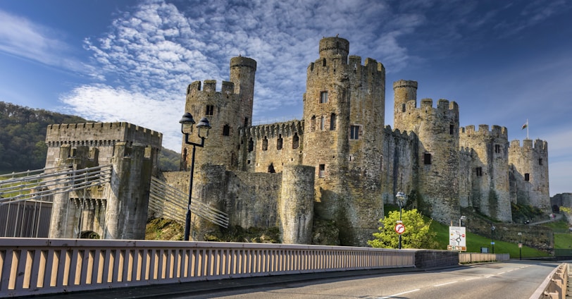 a large castle sitting on the side of a road