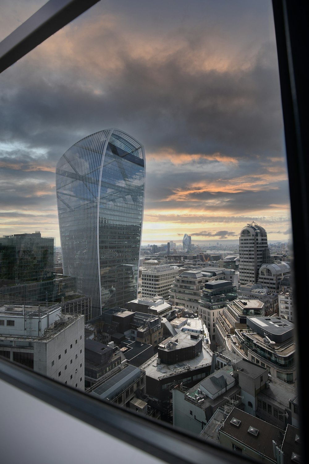 a view of a very tall building from a window