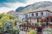 A scenic view of the mountains from the restaurant's terrace, showcasing the natural beauty of the surroundings.