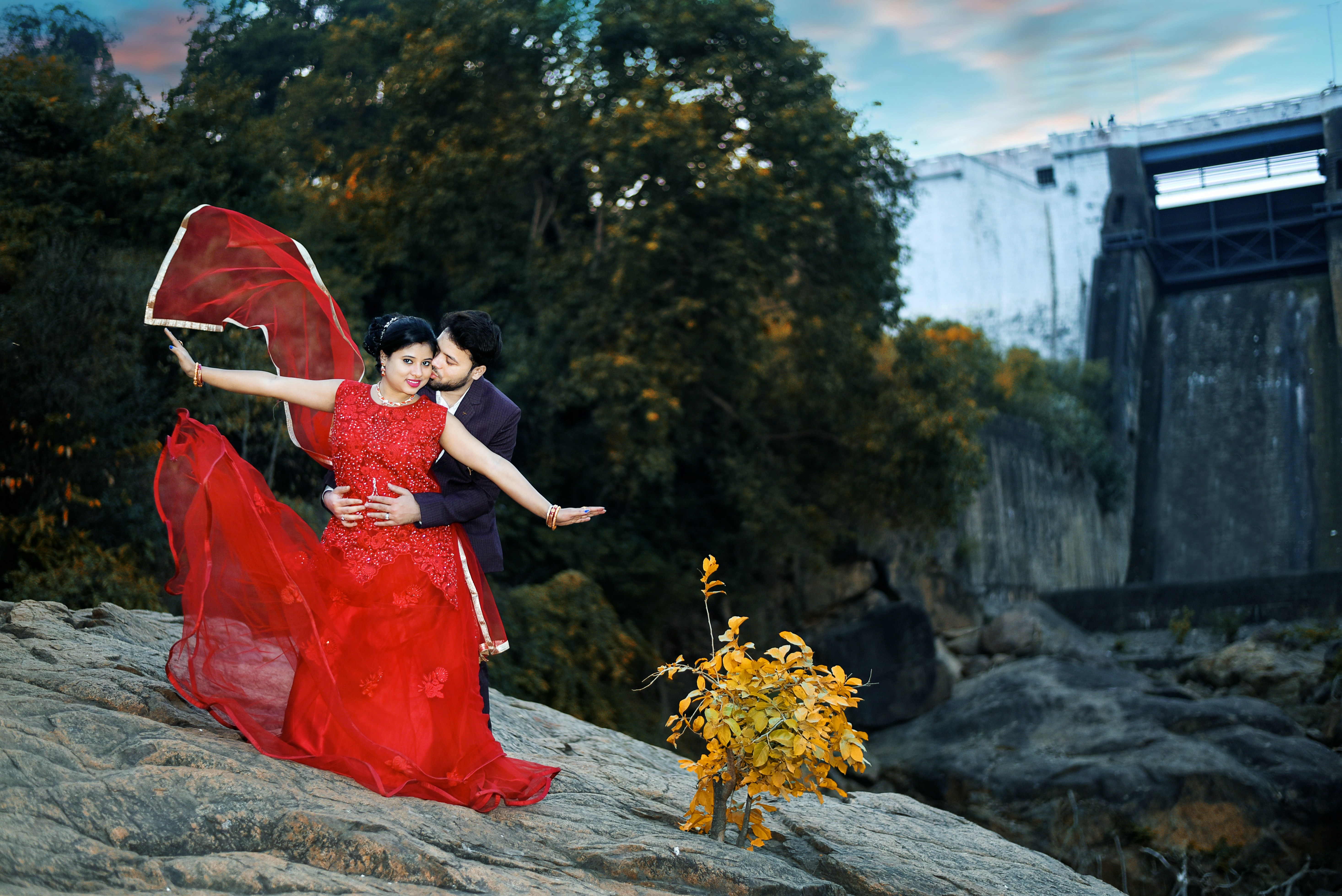 Carmen posing with red umbrella